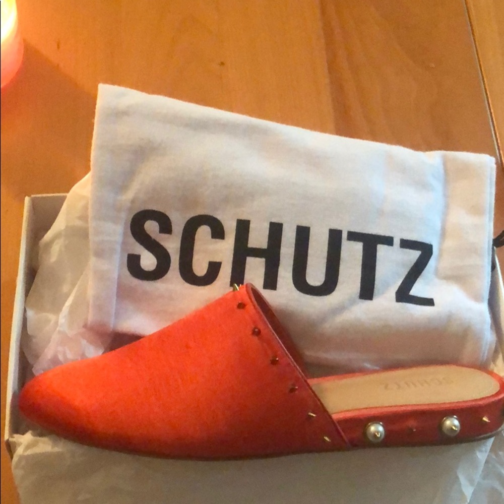 Schutz size 9.5 mules.